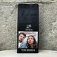 Verpackung von True Beans Peru Arabica Kaffee mit einem individuellen Etikett, das ein Bild von zwei Personen zeigt.